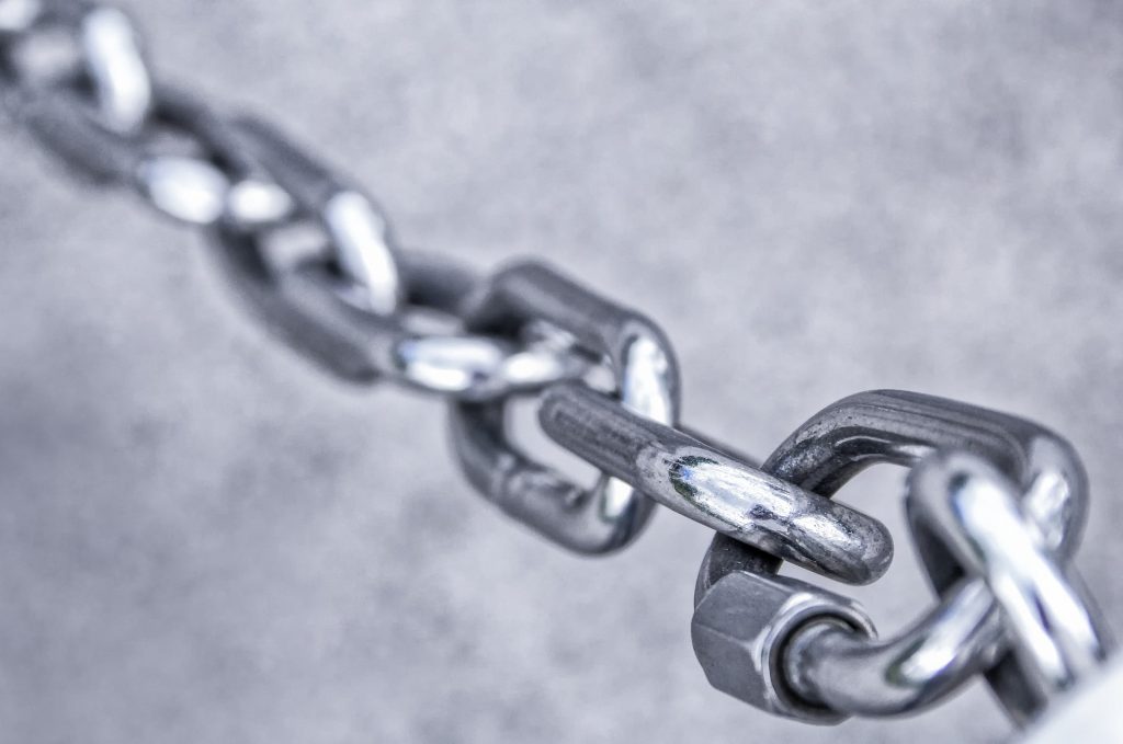 What is the importance of backlinks in SEO, and how can you build high-quality backlinks?