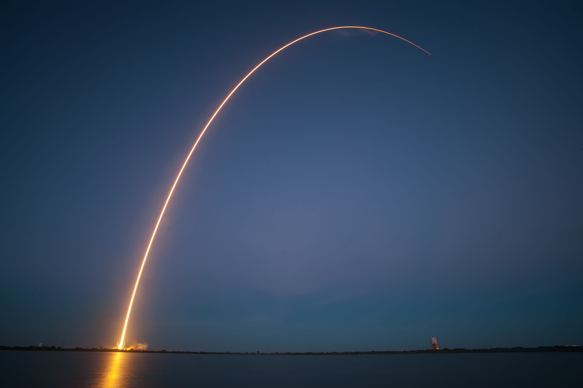 THIS IS AN IMAGE OF A ROCKET LAUNCH SHOWCASING SPEED. THIS SYMBOLISES WEBSITE SPEED.